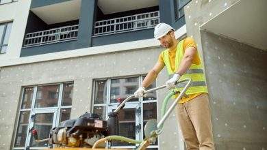 effort fatigue young adult tired man protective helmet bright vest with special equipment working construction site against background new building 259150 57671