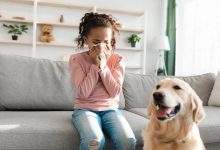 girl sneezing