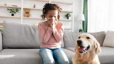 girl sneezing